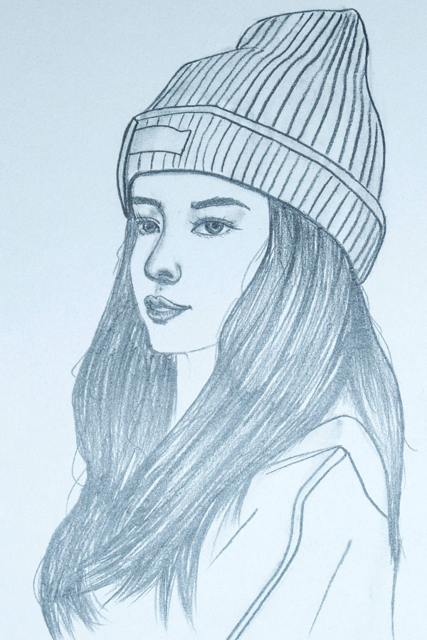 girl in a hat drawing